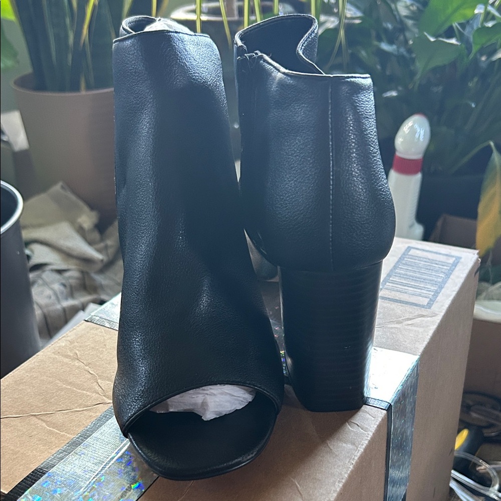 Sleek Black Open-Toe Heeled Boots